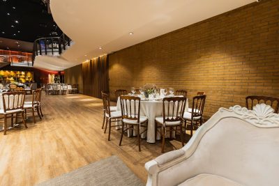 tables and chairs arranged in a restaurant